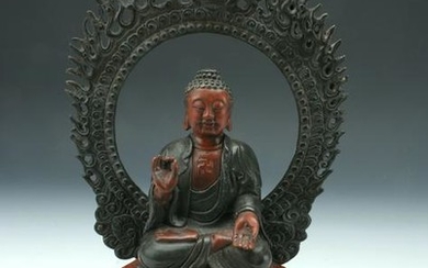 RED BRONZE BUDDHA WITH FLAMING ARCH