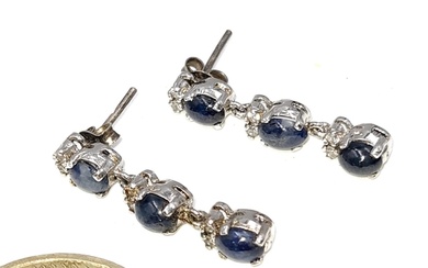 Star Lot : A pretty pair of Cabochon sapphire gemstone stud ...