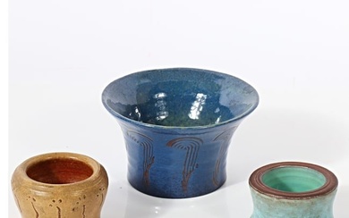 Three hand thrown primitive glazed stoneware American studio pottery vessels. 3 1/8"H x 5 5/8"Diam.