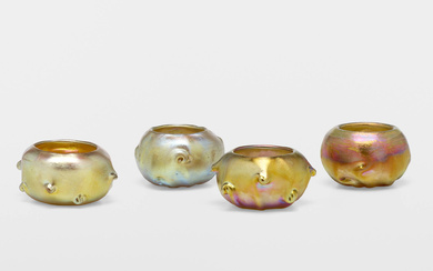 Tiffany Studios Collection of four salt cellars with prunts