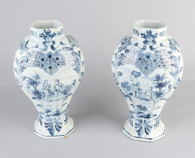 Two 19th century octagonal Delft Fayence vases. Figures