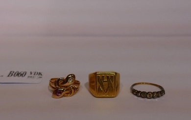 A signet ring and 2 rings in 18 karat yellow...