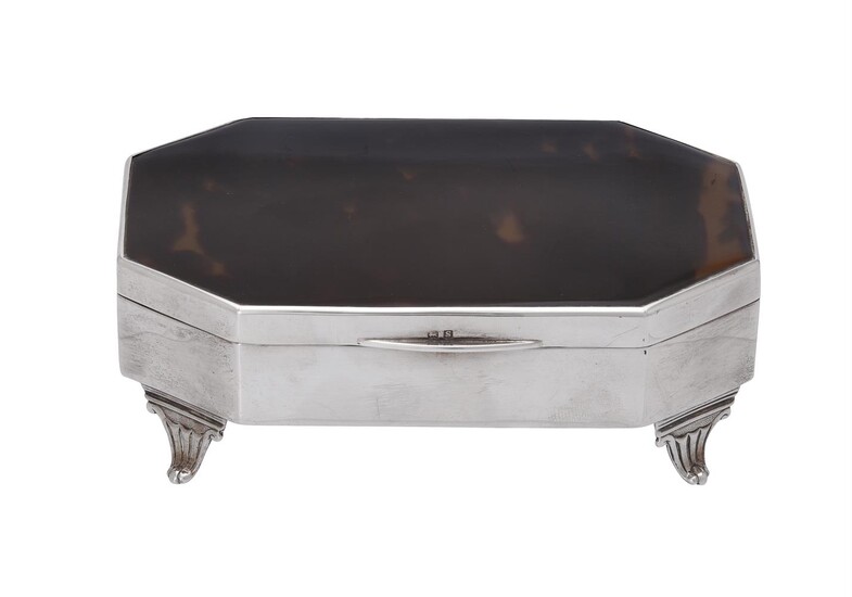 Y A silver and tortoiseshell canted-rectangular dressing table box by E. S. Barnsley & Co.