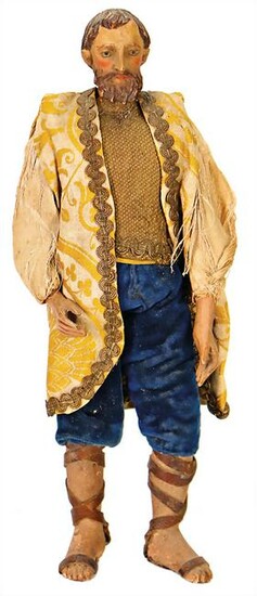 wood-doll, head and torso are carved of one piece