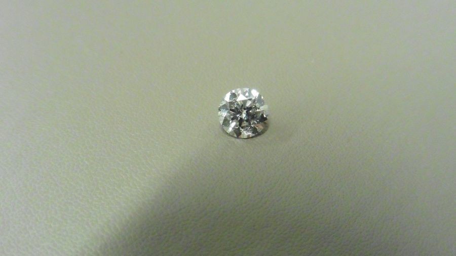 1.04ct brilliant cut diamond, loose stone.K colour and...