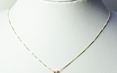 14K yellow gold necklace and pendant set with a natural...