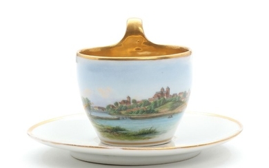 A 19th century Royal Copenhagen painted porcelain cup and saucer.