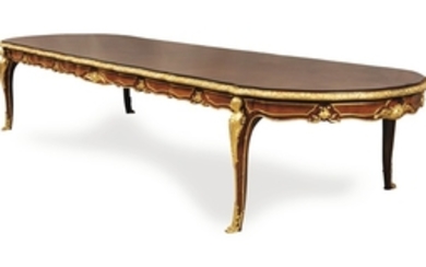 Attributed to Emmanuel-Joseph Zwiener A French gilt-bronze mounted tulipwood and rosewood dining table, Paris, circa 1890