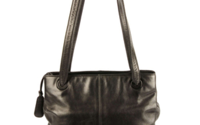 CHANEL - a black leather handbag.