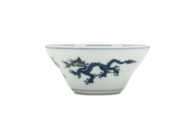 A CHINESE DOUCAI ‘DRAGON’ BOWL. Of conical form,...