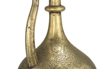 AN ENGRAVED BRASS EWER (AFTABE), SAFAVID IRAN, EARLY 17TH CENTURY