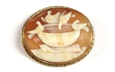 A gold mounted gold shell cameo brooch