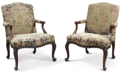 Two pairs of George III Style mahogany armchairs with tapestry upholstery