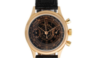 Breitling. An 18K rose gold manual wind chronograph wristwatch