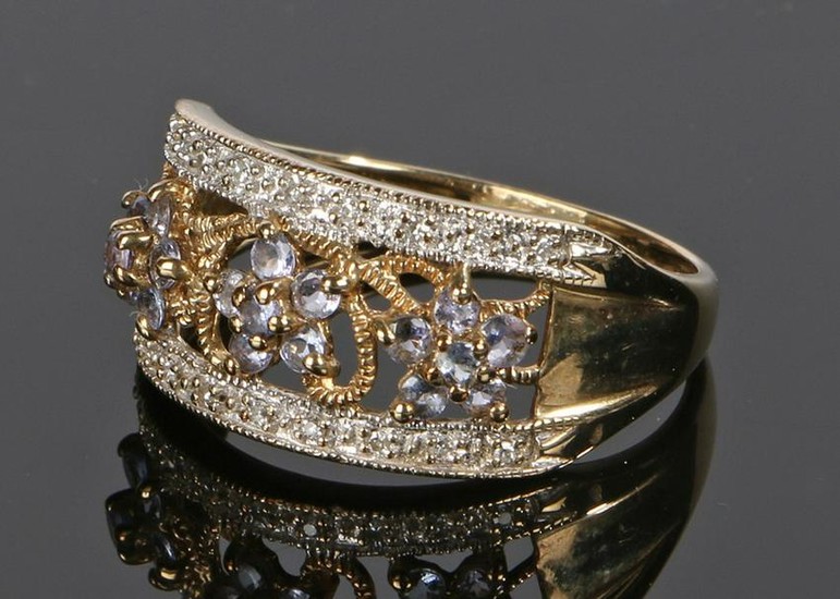 9 carat gold diamond and tanzanite ring, with wide
