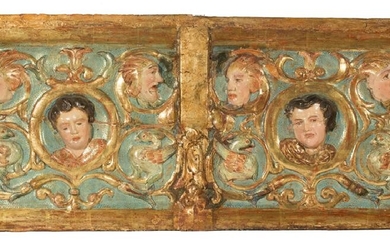 Carved, polychromed and gilded wooden relief.