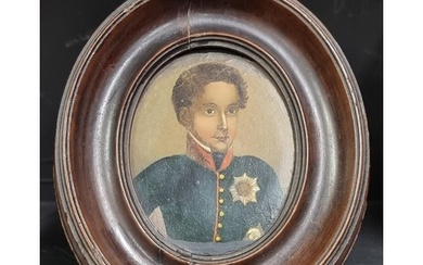 A 19th century Russian portrait miniature of a young man in ...