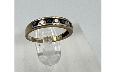 A 9ct gold diamond and sapphire ring, approximate size I.