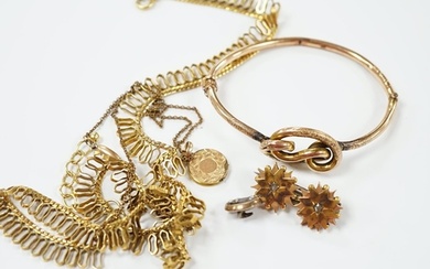 A 9ct. gold fringe necklace, 49cm(a.f.) a 9ct. gold bangle, ...