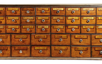 AMENDED - A BANK OF MAHOGANY AND PINE APOTHECARY DRAWERS