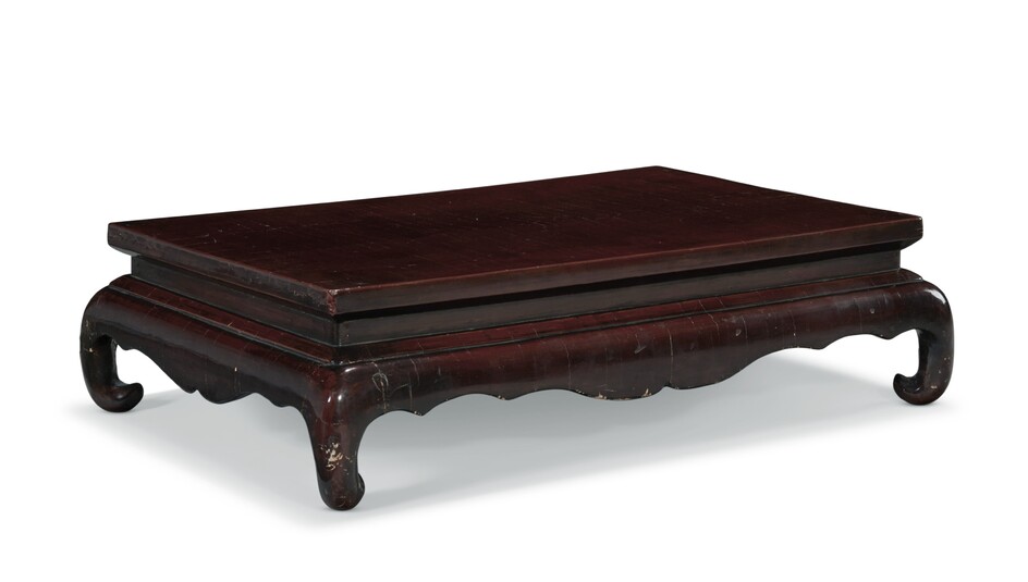 A CHINESE BROWN LACQUER KANG TABLE, 18TH-19TH CENTURY