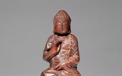 A CHINESE BUFFALO HORN FIGURE OF BUDDHA PROBABLY LATE QING...