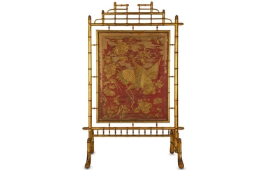 A CHINESE EMBROIDERED RED-GROUND SILK PANEL.