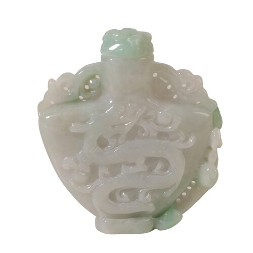 A CHINESE JADE SNUFF BOTTLE AND STOPPER of flattened baluste...