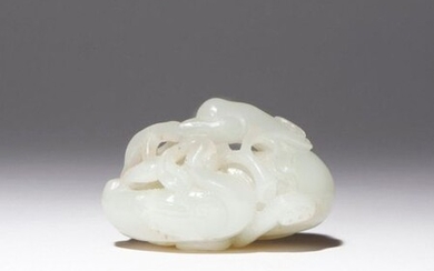 A CHINESE PALE CELADON JADE CARVING OF TWO GEESE 18TH...