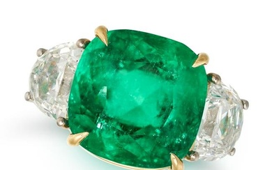 A COLOMBIAN EMERALD AND DIAMOND RING in 18ct white and yellow gold, set with a cushion cut emerald