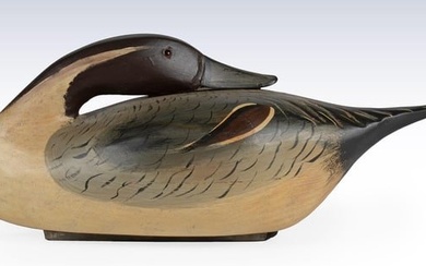 A Carved and Painted Pintail Drake Preening Duck Decoy