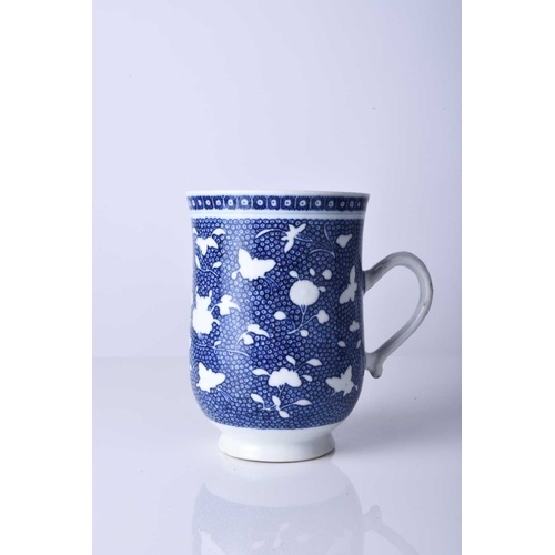 A Chinese blue and white mug, 18th century Of bell form and ...