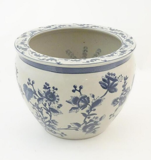 A Chinese blue and white planter / jardiniere with