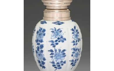 A Chinese blue and white vase, 18th c, lobed ovoid on flared...