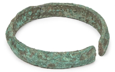 A Chinese bronze neck ring, Neolithic period, with central ridge,...