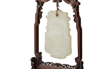 A Chinese carved hardstone hanging pendant