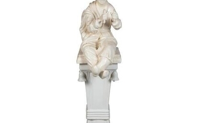 A Continental Blanc de Chine Figure of a Seated Chinese