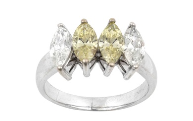 A Diamond Four Stone Ring two fancy yellow marquise cut...