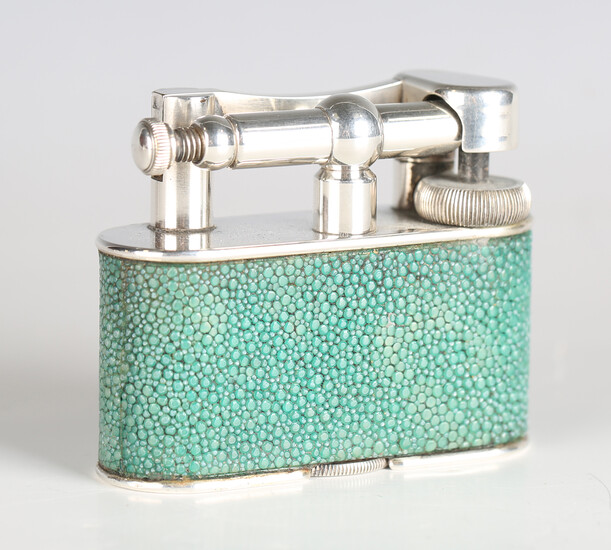 A Dunhill silver plated and shagreen table lighter, patent design No. 737418, width 8.5cm.