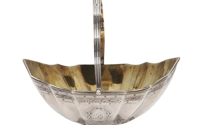 A GEORGE III SILVER SWING-HANDLED SUGAR BASKET. with a flute...