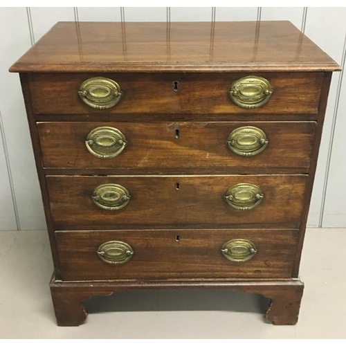 A Georgian, mahogany chest of four drawers. Missing drawer b...