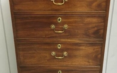 A Georgian narrow/tall chest of five graduated drawers. Brass...