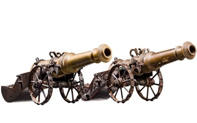 A German pair of Victorian miniature cannons in the style of Michel Mann, 19th century