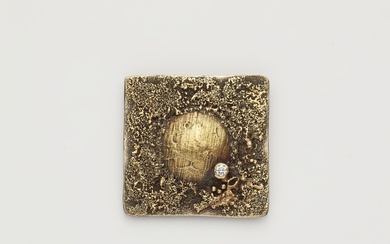 A German silver and textured 18k gold buckle brooch.