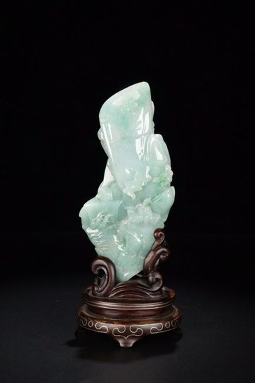A JADEITE CARVED MOUNTAIN SHAPED PENDANT