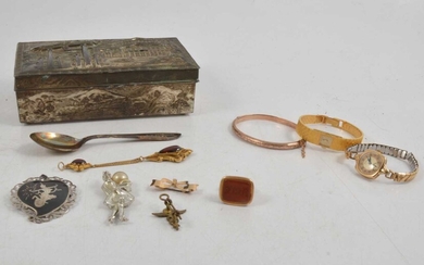 A Japanese cigarette box, niello pendant, seal, bangle.