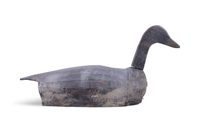 A LARGE CARVED DECOY, with rotating head. 80(w) x...