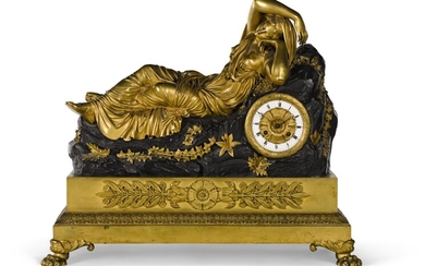 A LARGE GILT AND PATINATED BRONZE SCULPTURAL MANTEL CLOCK DEPICTING CLEOPATRA, FRENCH, CIRCA 1820