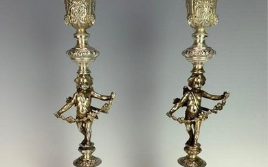 A LARGE PAIR OF CONTINENTAL SILVER CANDELSTICKS