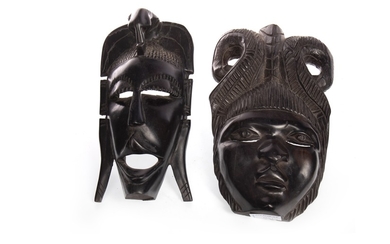 A LOT OF SEVEN AFRICAN WOOD WALL MASKS